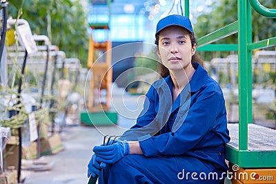 Female Worker on Break in Plantation Stock Photo