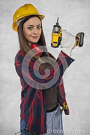 Female worker, handyman at home Stock Photo