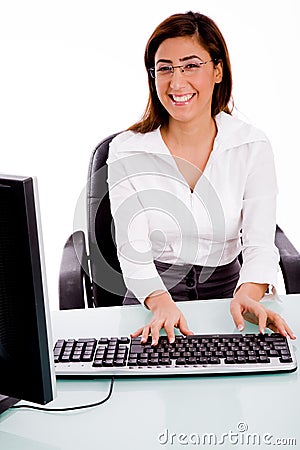 Female working on computer Stock Photo