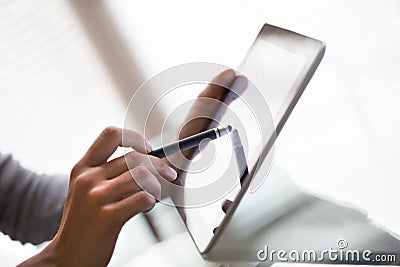 Female working with stylus and digital tablet pc Stock Photo