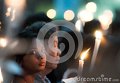 Female Worshiper at Good Friday Mass Editorial Stock Photo