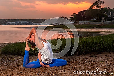 Female Yoga Model Eka Pada Rajakapotasana Mermaid Pose Beach Stock Photo