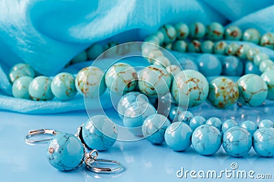 Feminine accessories framed background, scarf jewelry, turquoise Stock Photo