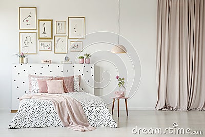 Feminine bedroom interior with gallery Stock Photo