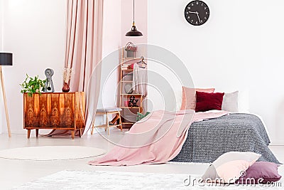 Feminine bedroom with walk-in closet Stock Photo