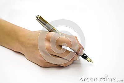 Feminine hand with pen Stock Photo