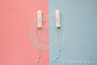 Feminine hygiene tampon on a pink background. The concept of feminine hygiene during menstruation. Flat lay, top view Stock Photo