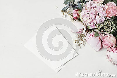 Feminine wedding, birthday mock-up scene. Decorative floral corner of peony, hydrangea, roses and locust flowers. Blank Stock Photo