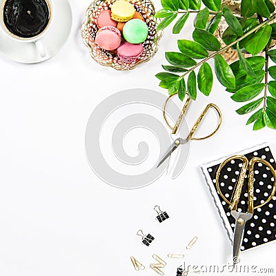 Feminine workplace coffee, macarons cookies, office supplies Stock Photo