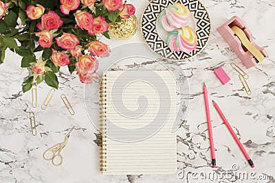 Feminine workplace concept. Freelance fashion comfortable femininity workspace in flat lay style with flowers, golden pineapple, n Stock Photo