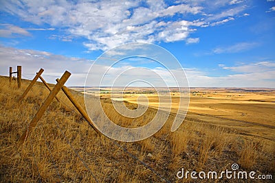 Fence in the American prairie Stock Photo