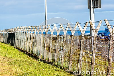 Fence around restricted area Stock Photo