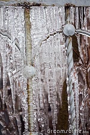 Fence frozen in ice Stock Photo