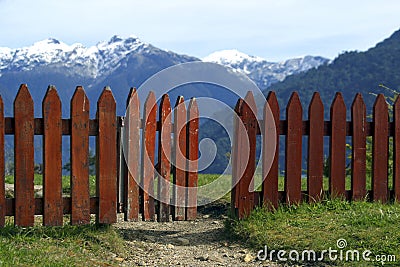 FENCE HALF OPEN IN THE TOP OF THE HILL Stock Photo