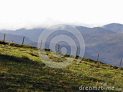 Fence, with mountains Stock Photo