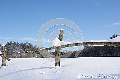 Fence in snow Stock Photo