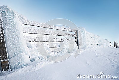 Fence in snow on the mountÐ°in hill.Fence in snow on the mountain hill,Chopok 2004m, Slovakia Stock Photo