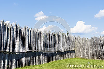 Fence with upright wooden poles at the Saint Marie Among the Hurons Stock Photo