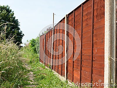 Fence of wood outside in field Stock Photo