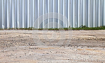 Fence zinc, Fence wall and ground, Wall Metal, Steel, stainless, zinc wall for background image construction area safety Stock Photo