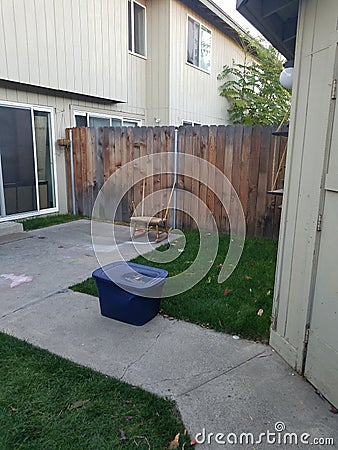 Fenced backyard and patio Stock Photo