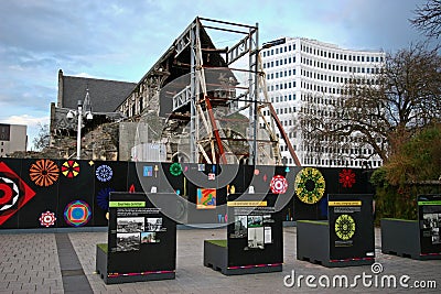 Fenced off debris of partially collapsed historic Christchurch Cathedral supported by steel frame seismic bracing in New Zealand Editorial Stock Photo