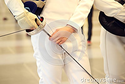 Fencer with fencing mask and rapier Stock Photo