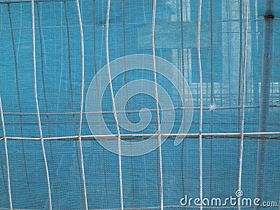 Fences with blue transparant gauze Stock Photo