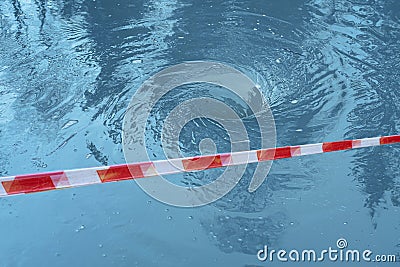 Fencing tape in front of a whirlpool Stock Photo