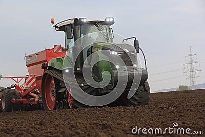 Fendt crawler tractor preparing a field in Germany Stock Photo