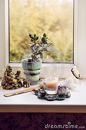 Feng Shui altar at home in living room or bed room. Attracting wealth and prosperity concept. Stock Photo