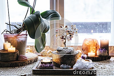 Feng Shui nature theme altar at home table and on window sill. Stock Photo