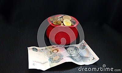 Feng Shui Red Coin Pot Stock Photo