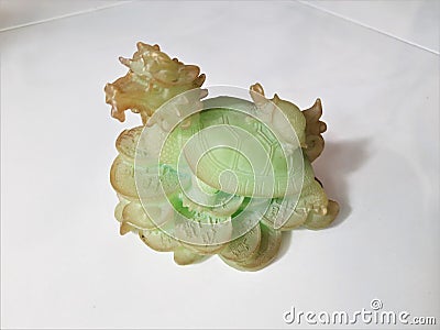 Fengshui Jade Green Dragon head Turtle body sculpture representing longevity wealth Stock Photo