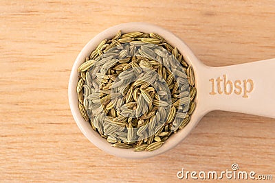 Fennel Seeds in a Tablespoon Stock Photo