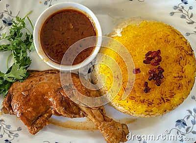 Fensanjan with rice is one of the most delicious Iranian cuisine, It is cooked with chicken meat Stock Photo