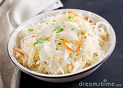 Fermented cabbage. Vegan food. Sauerkraut with carrot and spices Stock Photo