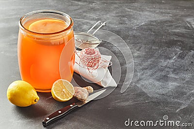 Fermented glass jar of black tea kombucha Stock Photo