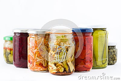 Fermented preserved vegetables in jar isolated on white background Stock Photo