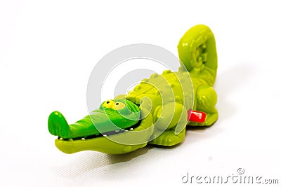 Ferocious young crocodile toy looks realistic Stock Photo