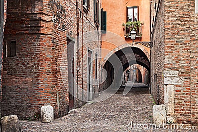 Ferrara, Italy, the medieval alley Via delle Volte Stock Photo