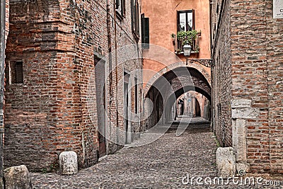 Ferrara, Italy, the medieval alley Via delle Volte Stock Photo