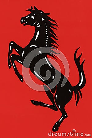 Ferrari logo on red background Editorial Stock Photo