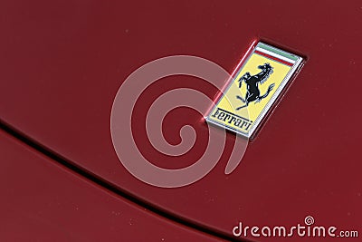 Ferrari logo on red sport car Editorial Stock Photo