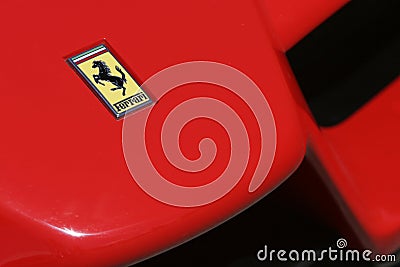 Ferrari logo on red sport car Editorial Stock Photo