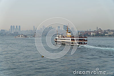 Ferries of istanbul, also known as vapur. Marmara sea and Istanbul cityscape in the background. Bosphorus ride Editorial Stock Photo