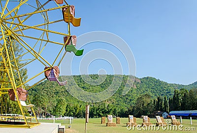 ferris wheel and target rang in park Stock Photo
