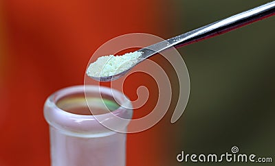 Ferrous sulphate with a steel spatula Stock Photo