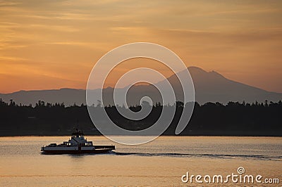 Ferry Boat With Mt. Baker in the Background. Stock Photo