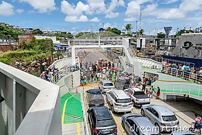 Ferry boat passengers disembarking at the Sao Joaquim maritime terminal in the city of Salvador, Bahia Editorial Stock Photo